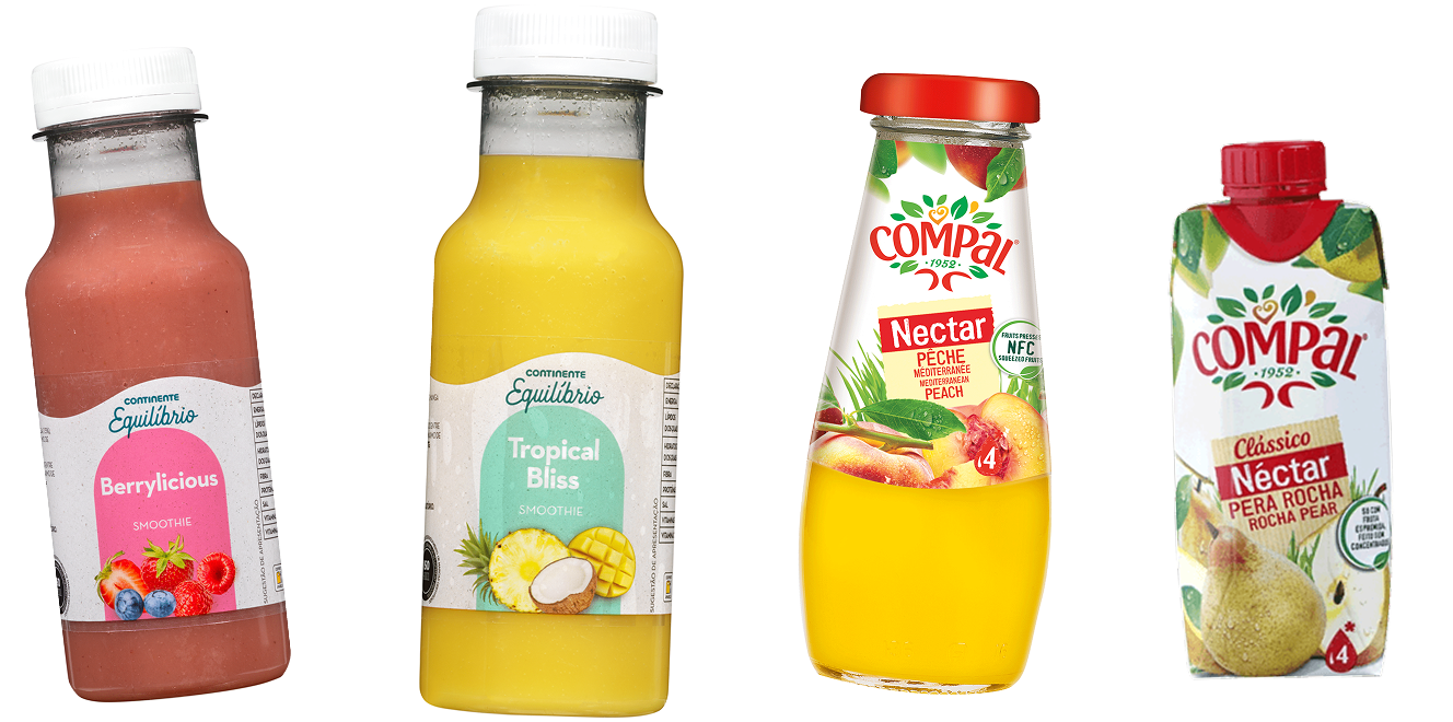 Four bottles of current sold juices, showing pretty fruits on the bottle